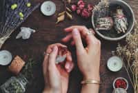Witches hands on a table ready for