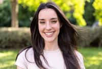 Young beautiful caucasian woman smiling at camera