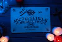 Close up shot of a wooden ouija