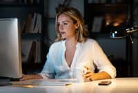 Shot of beautiful entrepreneur woman working with