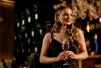 Elegant woman enjoying a glass of wine