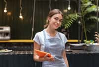 Beautiful waitress. Beautiful waitress wearing her uniform