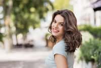 Beautiful happy young woman closeup portrait. Pretty