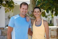 Portrait of a happy couple jogging together
