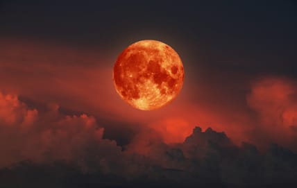 Blood Moon, Red moon, real full blood moon in black sky with cloud. Elements of this image furnished by NASA.