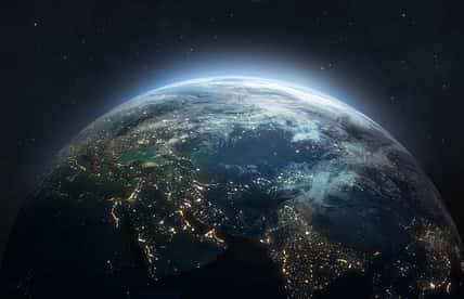 Nightly planet Earth in dark outer space.