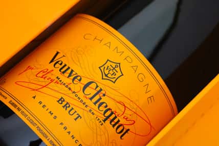 Bottle of Champagne Veuve Clicquot Brut in box. Studio shot.