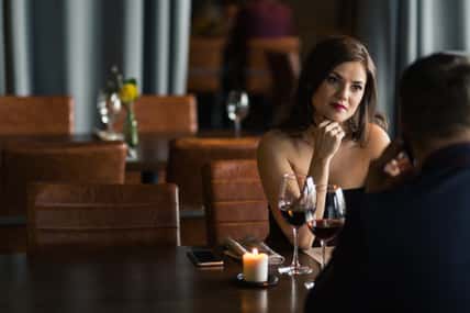 Couple with romantic dinner in restaurant