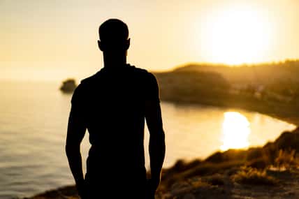 silhouette of a man on the beach