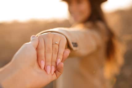 woman with an engagement ring