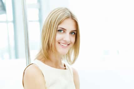 pretty young blonde woman with a bob haircut