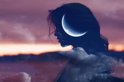 Beautiful woman profile silhouette portrait with moon
