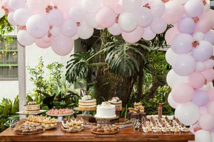 Table with sweets, desserts and cakes, decorated table for reception.