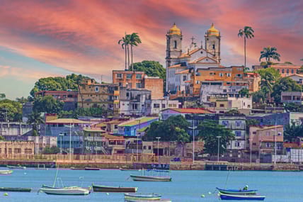 Panoramic view of the old town of Salvador de Bahia from the opposite coast in the afterglow during sunset
