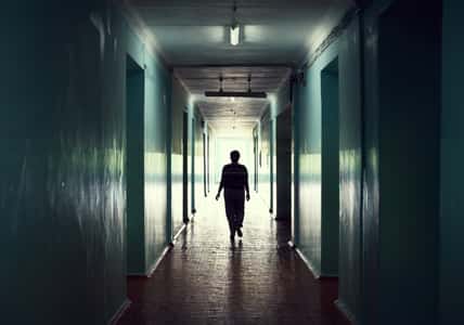 silhouette in a corridor. Light at the