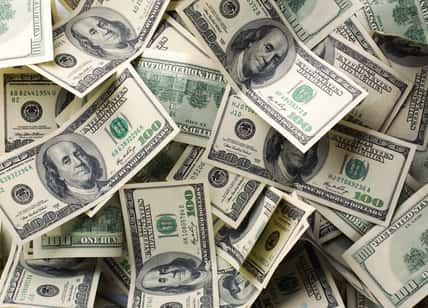 Heap of $100 dollar bills