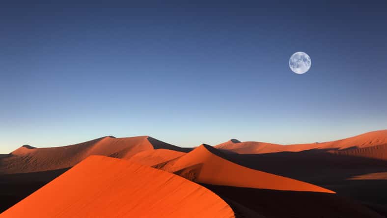 Red sand dune with full moon, Sossusvlei, Namibia