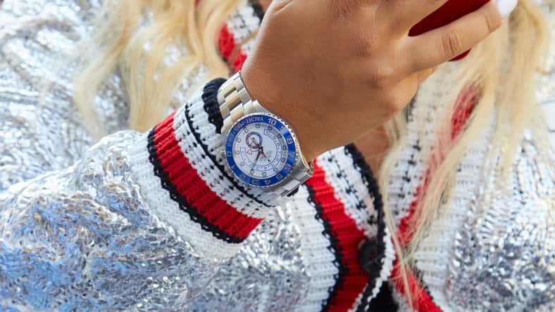 MILAN, ITALY - SEPTEMBER 21, 2019: Woman with Rolex Yacht Master and silver sweater before Ermanno Scervino fashion show, Milan Fashion Week street style