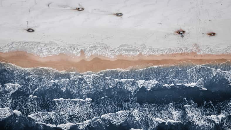 Fishing boats on the Baltic Sea in winter, aerial view, Poland