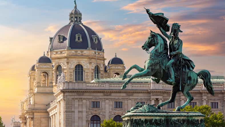 Statue of Archduke Charles on Heldenplatz square and Museum of Natural History dome, Vienna, Austria