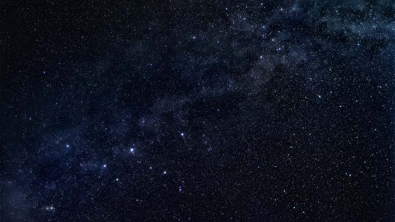 Constellation Cassiopeia with stellar band of our galaxy, the Milky Way, in the dark starry sky