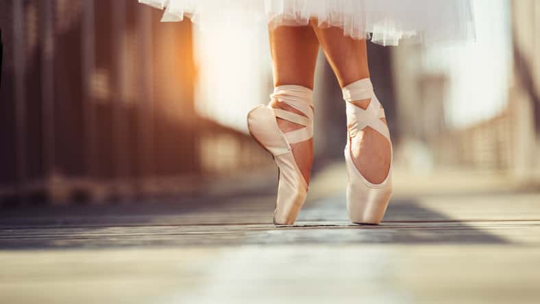 beautiful legs of female classic ballet dancer in pointe