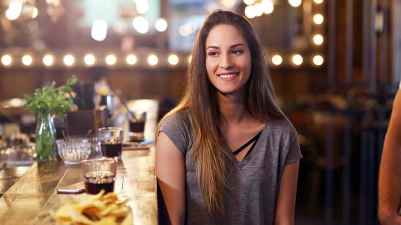 Picture of young woman sitting in a cafe
