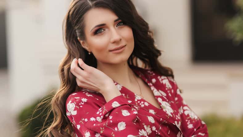 Portrait of brunette model. Girl with hairstyle and makeup.