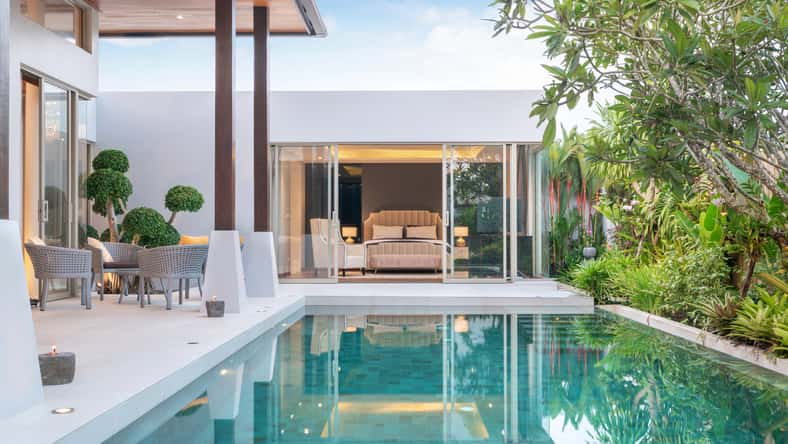 home or house building Exterior and interior design showing tropical pool villa with green garden and bedroom