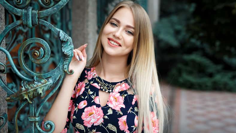 Beautiful young blonde girl portrait in urban style