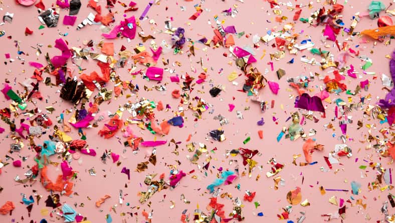 Bright colourful party sparkling party confetti background
