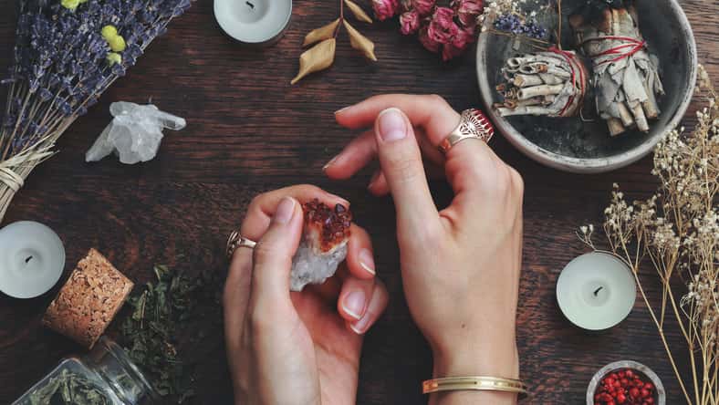 Witches hands on a table ready for