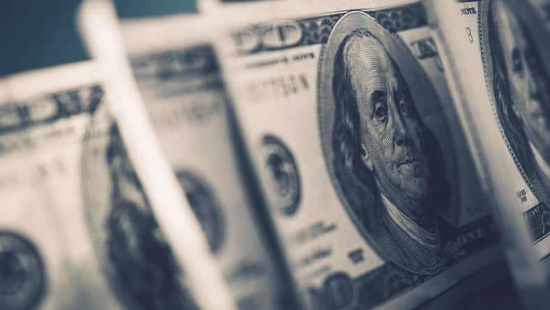 American Dollars in Focus. Benjamin Franklin One Hundred Dollars Banknotes. Dollar Trading.