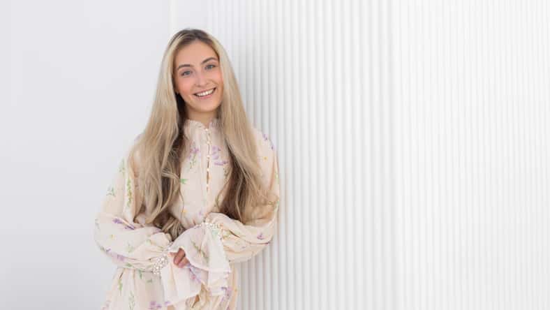 cute caucasian young happy female in light dress