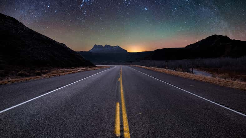 highway at night with stars