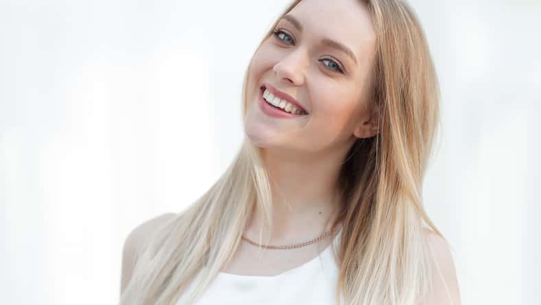 close-up portrait of an elegant young business woman. Photo has a blank space for text