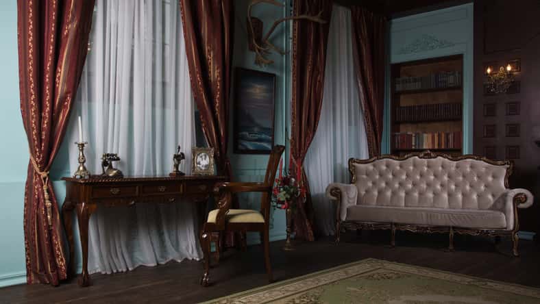 Classical library room with old books on shelves in the victorian style