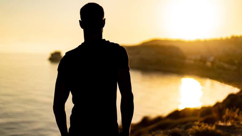 silhouette of a man on the beach