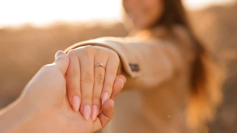 woman with an engagement ring