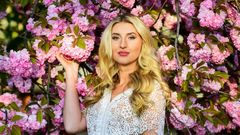 Tenderness and femininity. Spring symbol. Girl enjoy sakura in garden. Rest relax and vacation. Spring blossom. Cherry tree. Floral aroma. Reasons why flowers make women happy. Happy spring day.