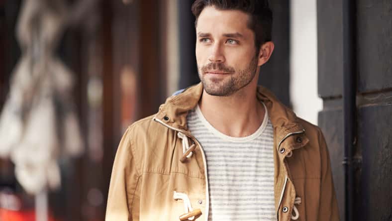 Cropped shot of a fashionable young man strolling through the city.
