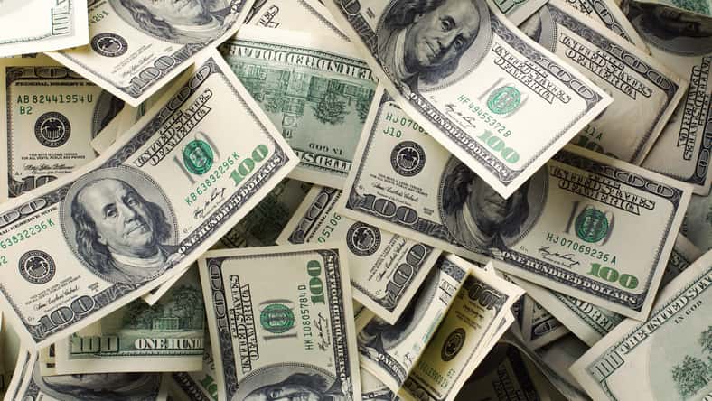 Heap of $100 dollar bills