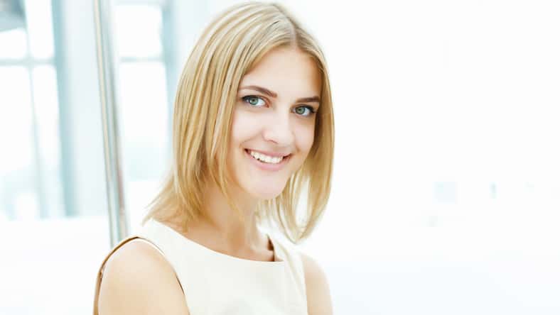 pretty young blonde woman with a bob haircut