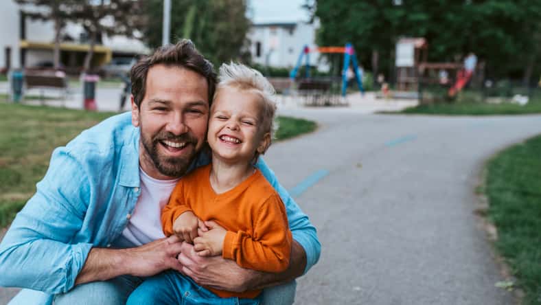 Portrait of dad and child enjoying time together. Fathers day concept.