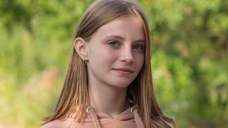 Portrait of a beautiful girl in nature, close up