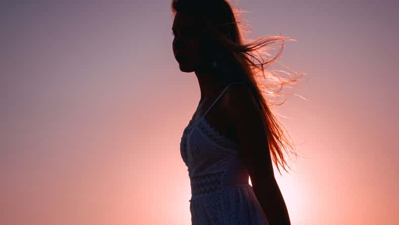 silhouette of a woman on sunset