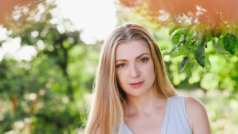Portrait of a beautiful blonde in nature