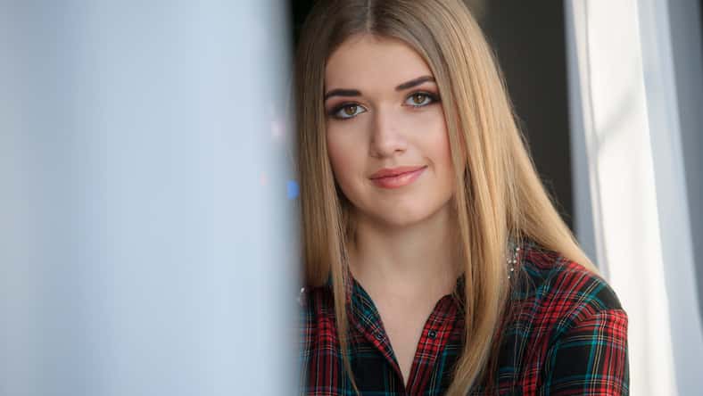 portrait of a beautiful young girl closeup home