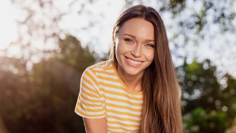 Portrait of attractive cheerful girl having fun spending free spare time vacation holiday festal day outdoors.