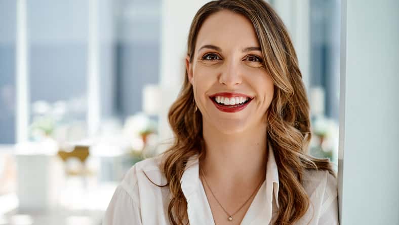 Portrait of an attractive young businesswoman standing inside her office.